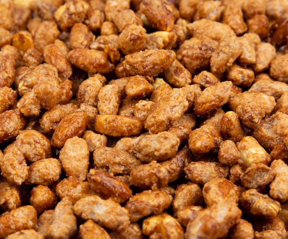 SweetGlob butter toffee peanuts close-up showing roasted nuts and golden crust, texture focus.
