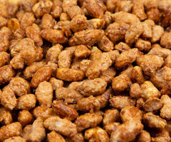 SweetGlob butter toffee peanuts close-up showing roasted nuts and golden crust, texture focus.