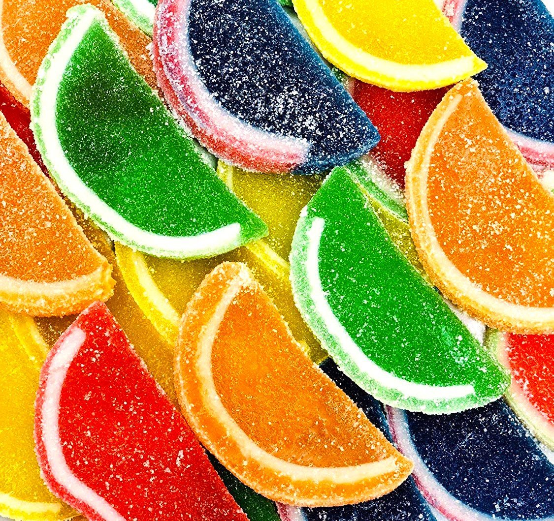 SweetGourmet Assorted Fruit Slices being poured into a bowl for snacking