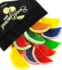 SweetGourmet Assorted Fruit Slices packaging showing vegan and gluten-free candy