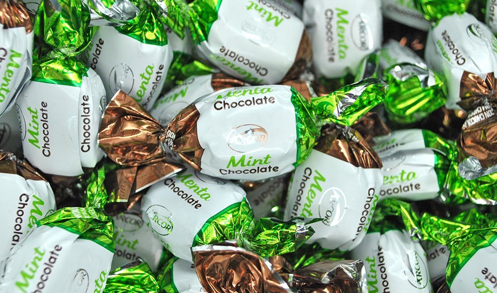 Refreshing mint chocolate finish from SweetGourmet mints after meals.