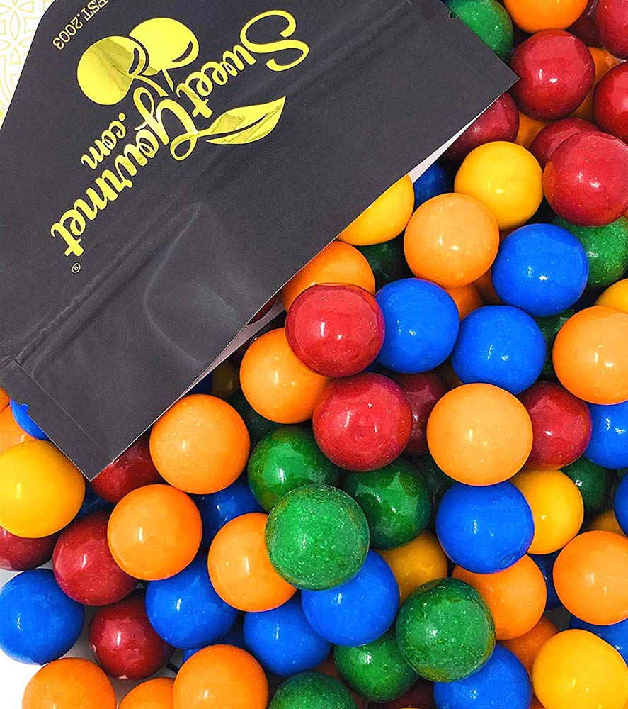 SweetGourmet Cry Baby Guts gumballs showcase bright shells and sour powder for a bold snack.