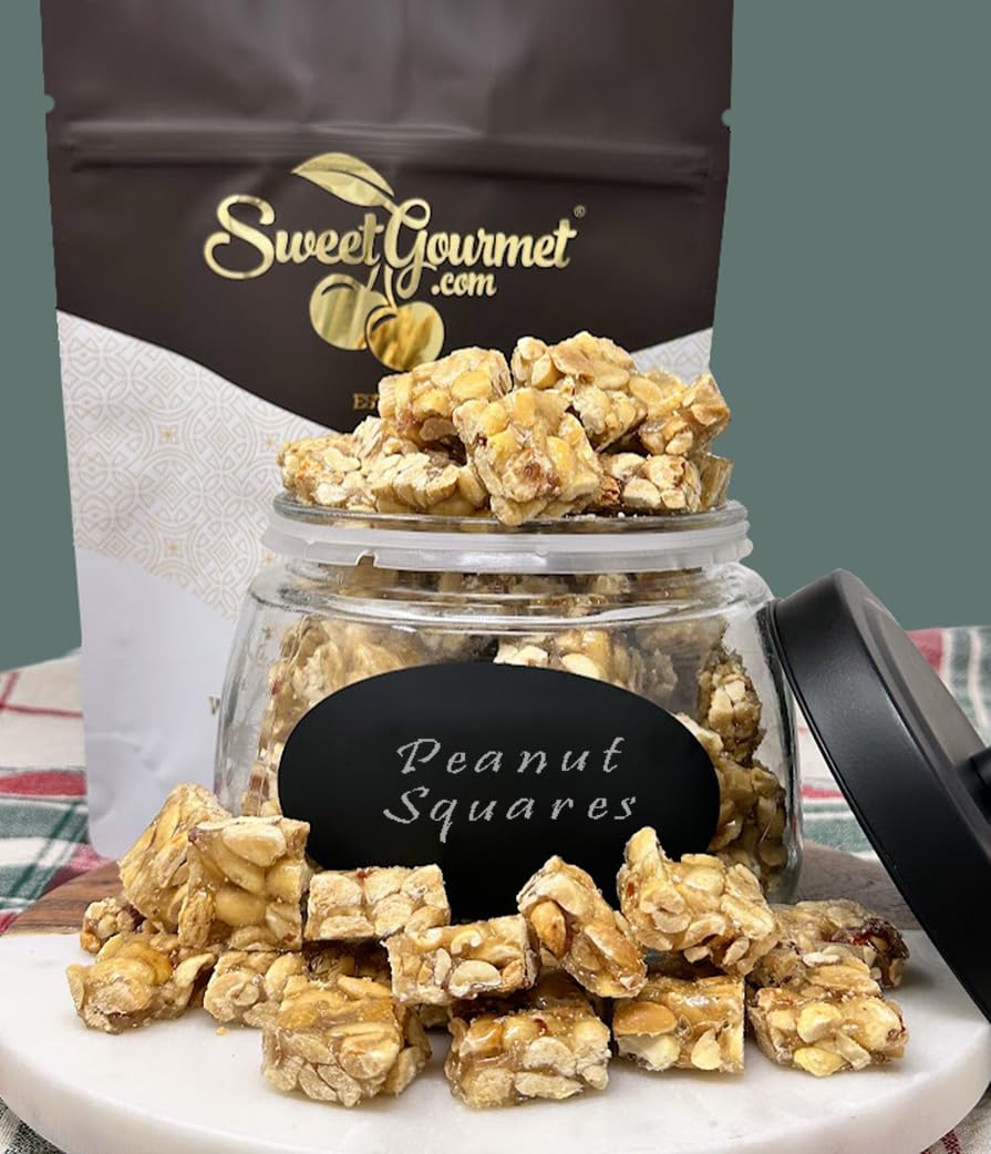 SweetGourmet peanut brittle squares bite-sized serving piece close-up.