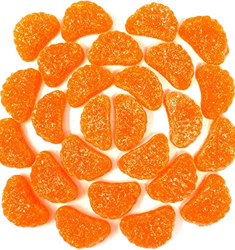 SweetGourmet sugar-coated orange slices close-up with glossy crystals, ideal for a quick snack.