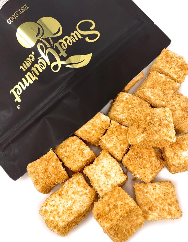 S'mores setup with coconut marshmallow cubes for tropical flair.