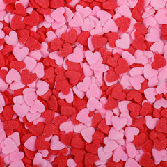 SweetGrove Heart Sprinkles crown a cupcake with vibrant red and pink charm, boosting visual appeal