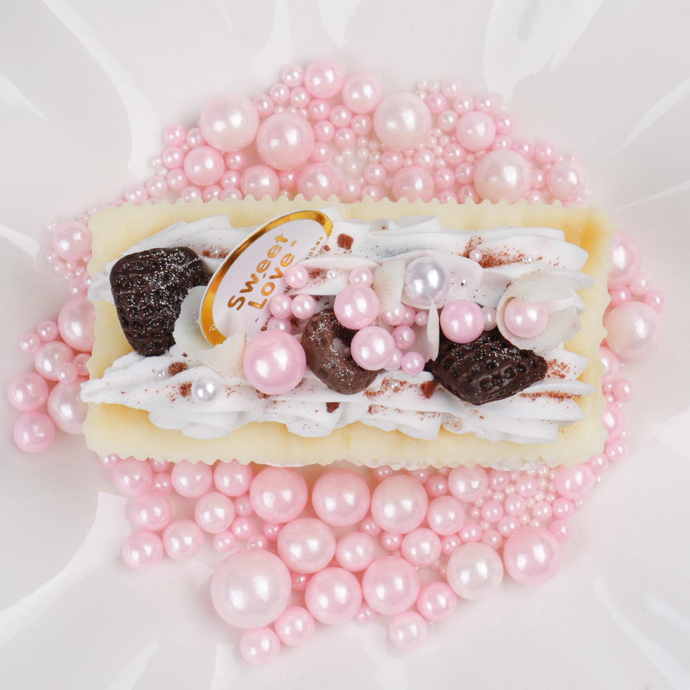 SweetGrove Pink Sprinkles toppers decorate cupcakes with a stylish pop of pink.