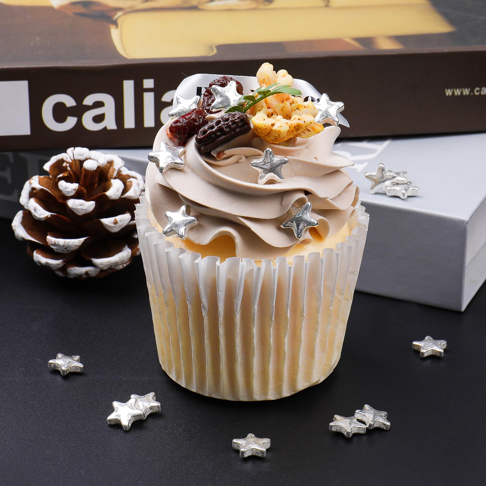 SweetGrove Silver Star Sprinkles on cupcakes for festive shine.
