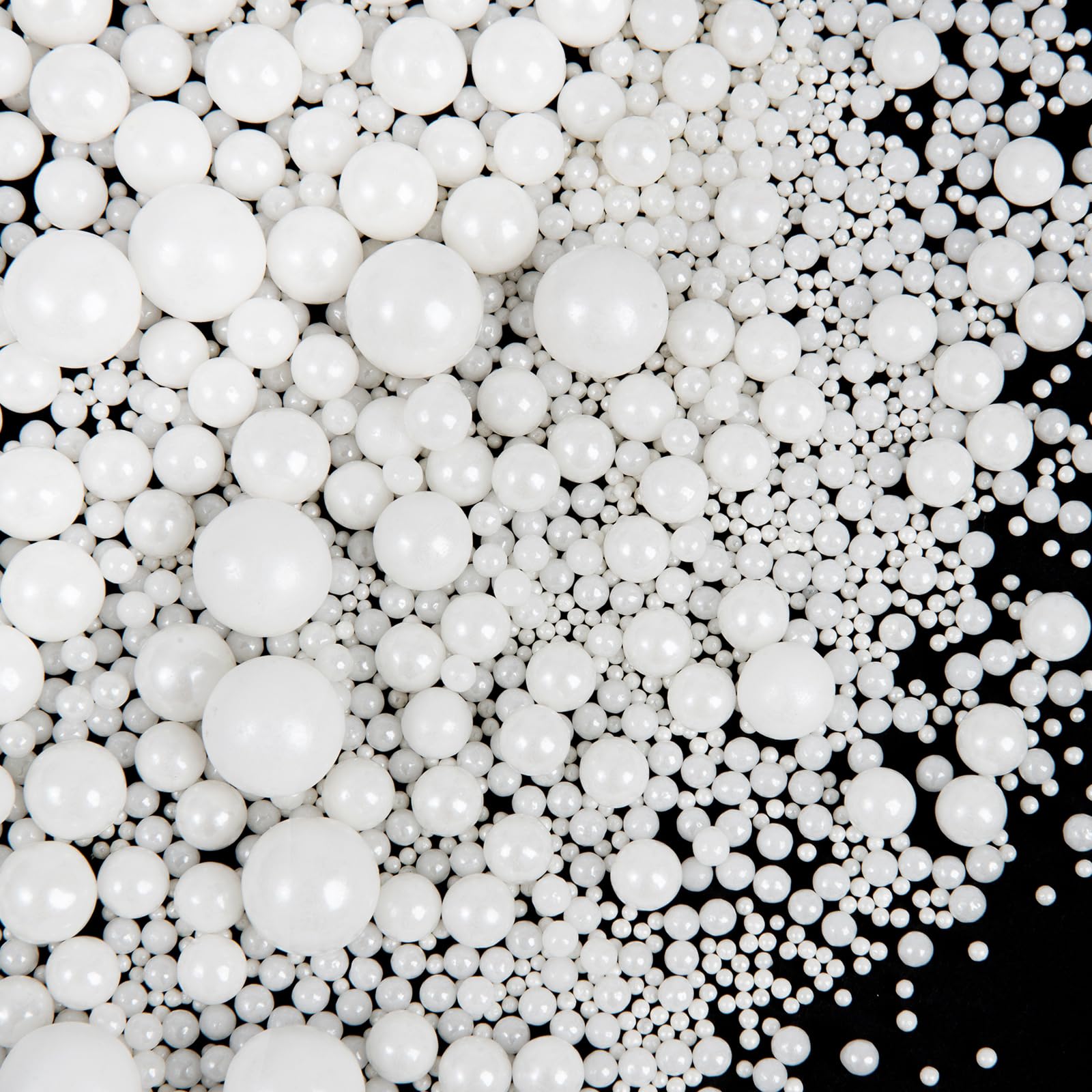 SweetGrove White Pearl Sprinkles on a cake for timeless wedding decoration.