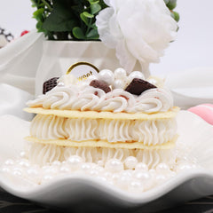 SweetGrove White Pearl Sprinkles on cookies for elegant finish.