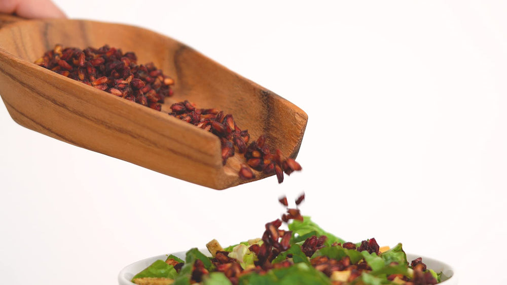 SweetHeart dried pomegranate seeds on a fresh salad – ideal topper for color and crunch.