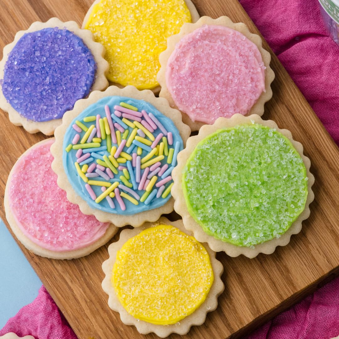 Sweets Indeed sprinkles on cookies and donuts add charming pastel details.
