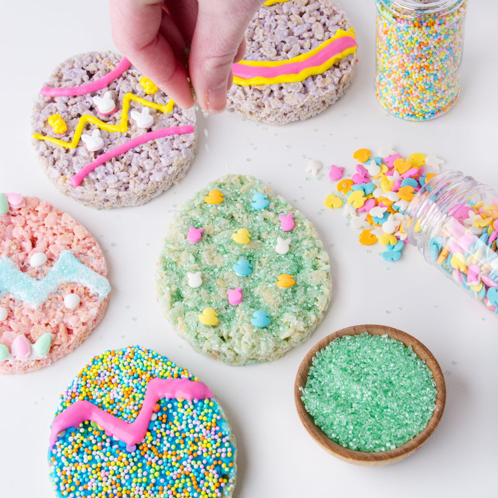 Sweets Indeed cake decorations with pastel accents for multi-layer desserts.
