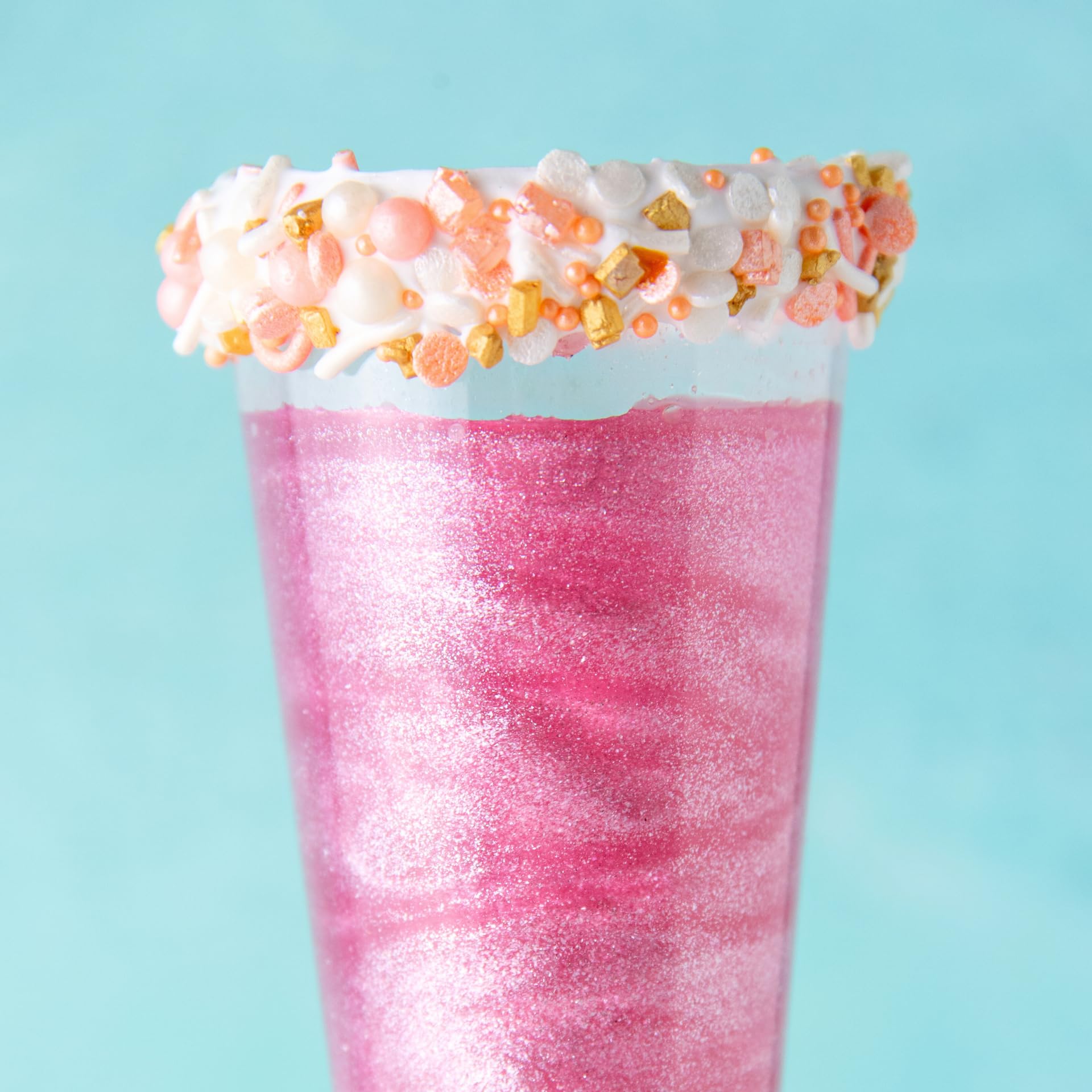 Sweets Indeed glitter on fondant adds glossy, party-ready shine.