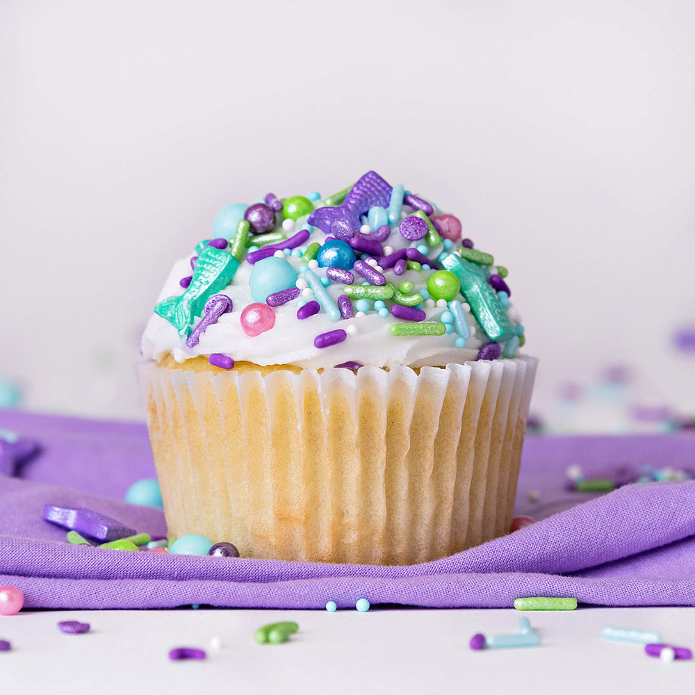 Sweets Indeed Mermaid Sprinkles decorate cookies with playful ocean hues.