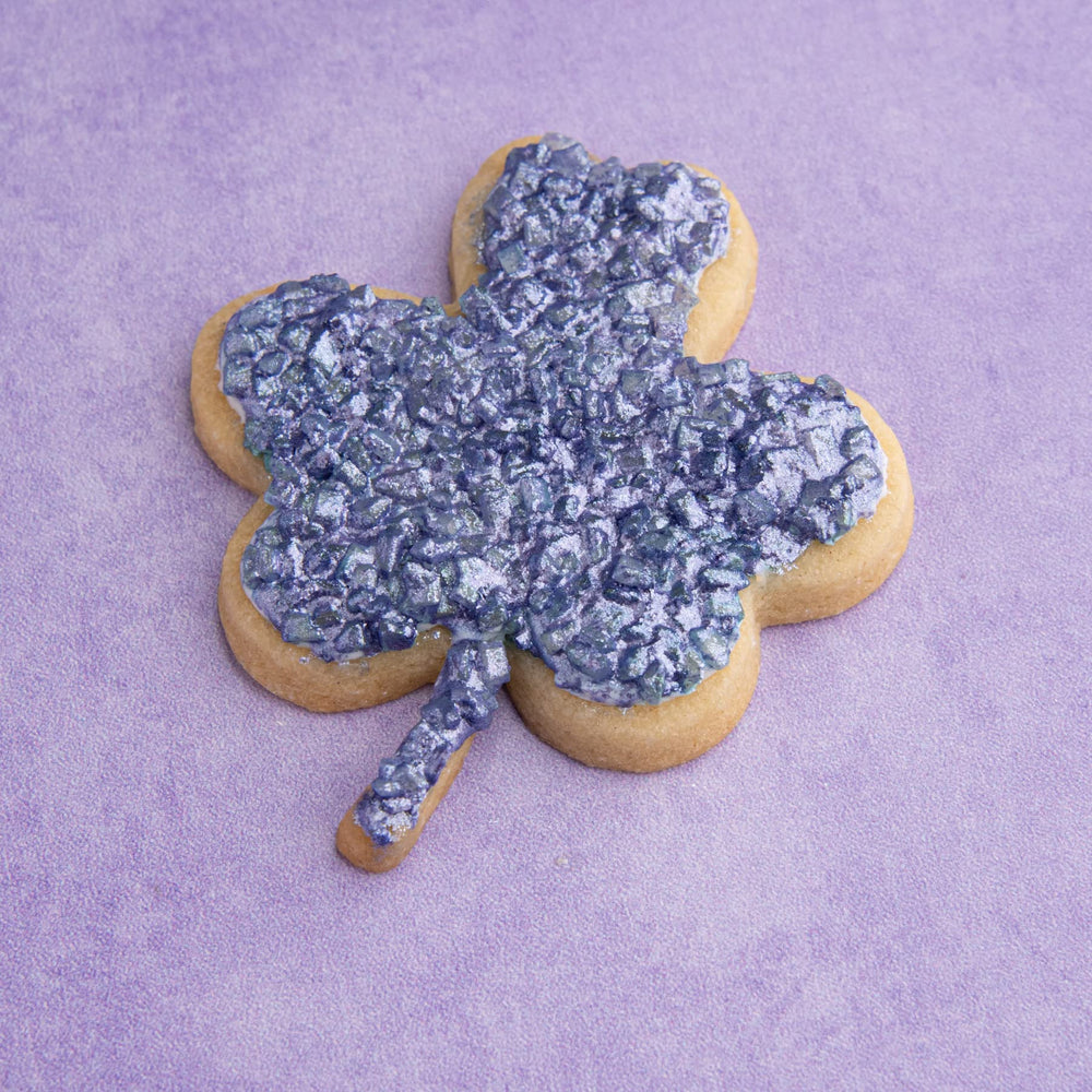 Sweets Indeed purple edible glitter enhances dessert plating with color