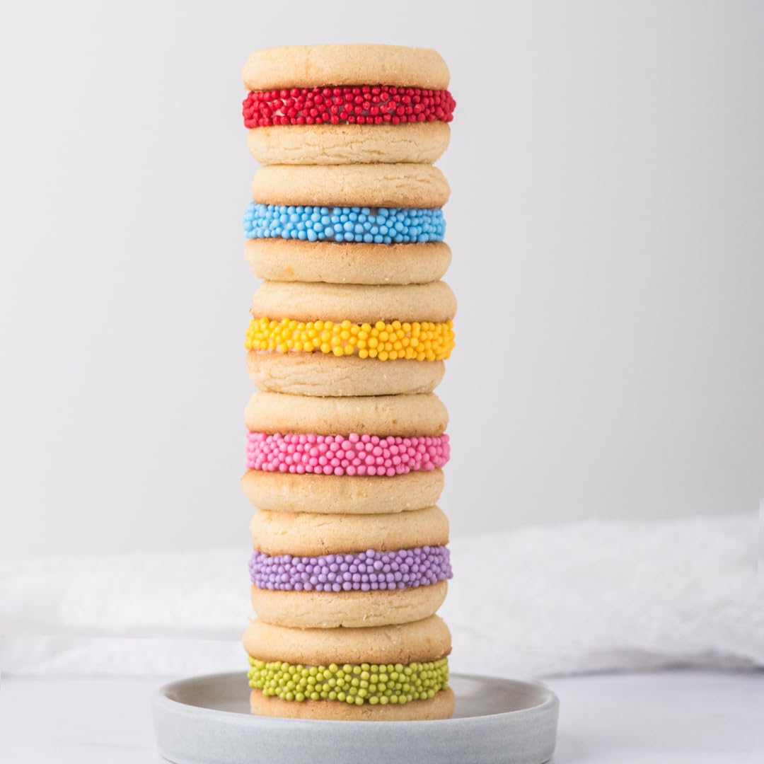 Sweets Indeed spring desserts feature rainbow nonpareils for seasonal charm.