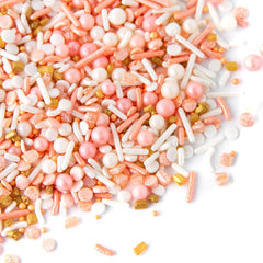 Sweets Indeed Peach Rose Gold sprinkles on ice cream for playful texture.
