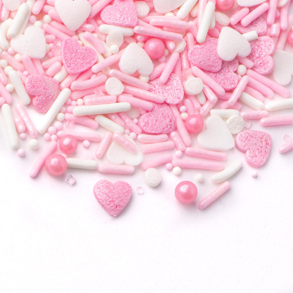 Sweets Indeed Valentines heart sprinkle mix pink heart shapes for romantic treats.