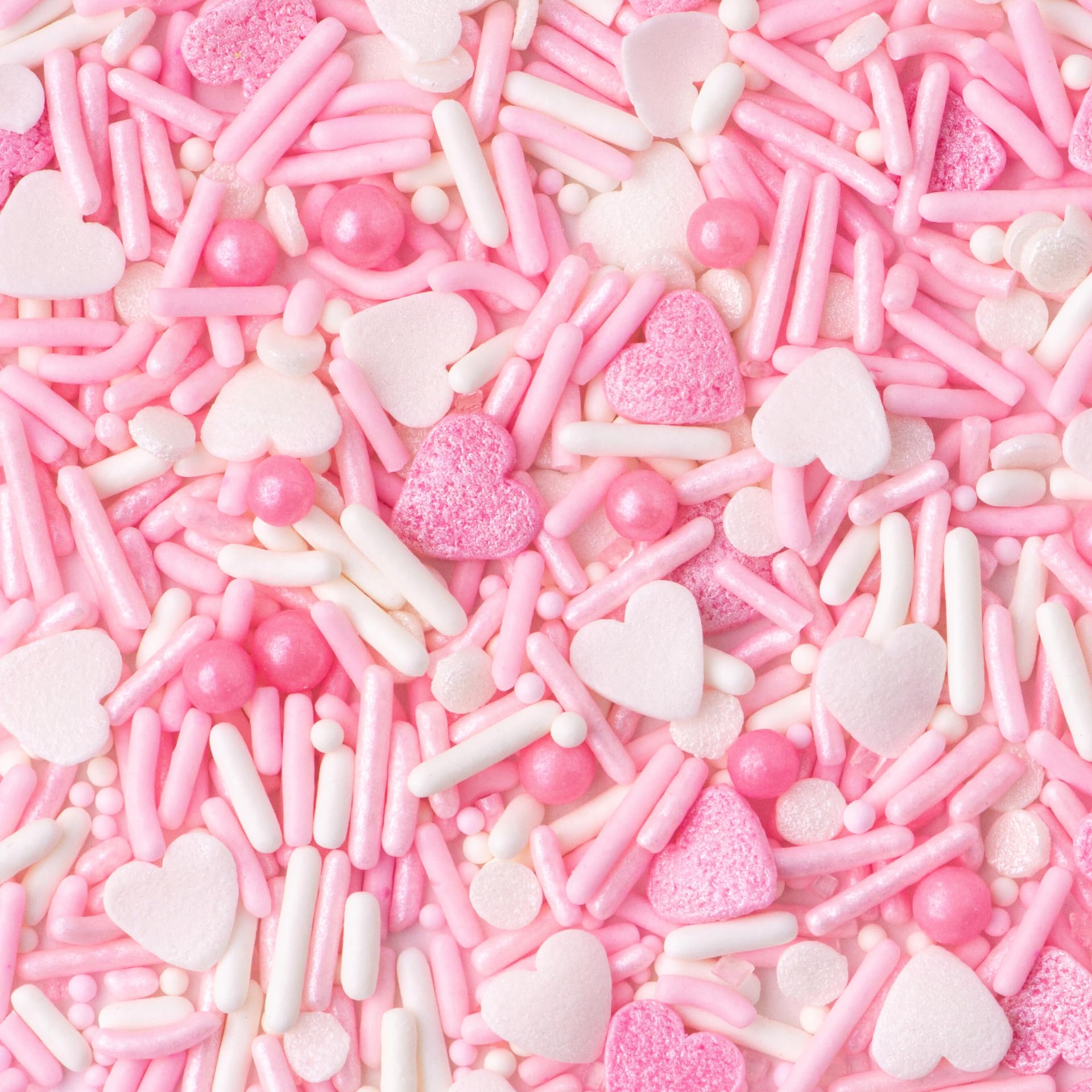 Sweets Indeed Valentines heart sprinkle mix nonpareils create subtle contrast on pastries.