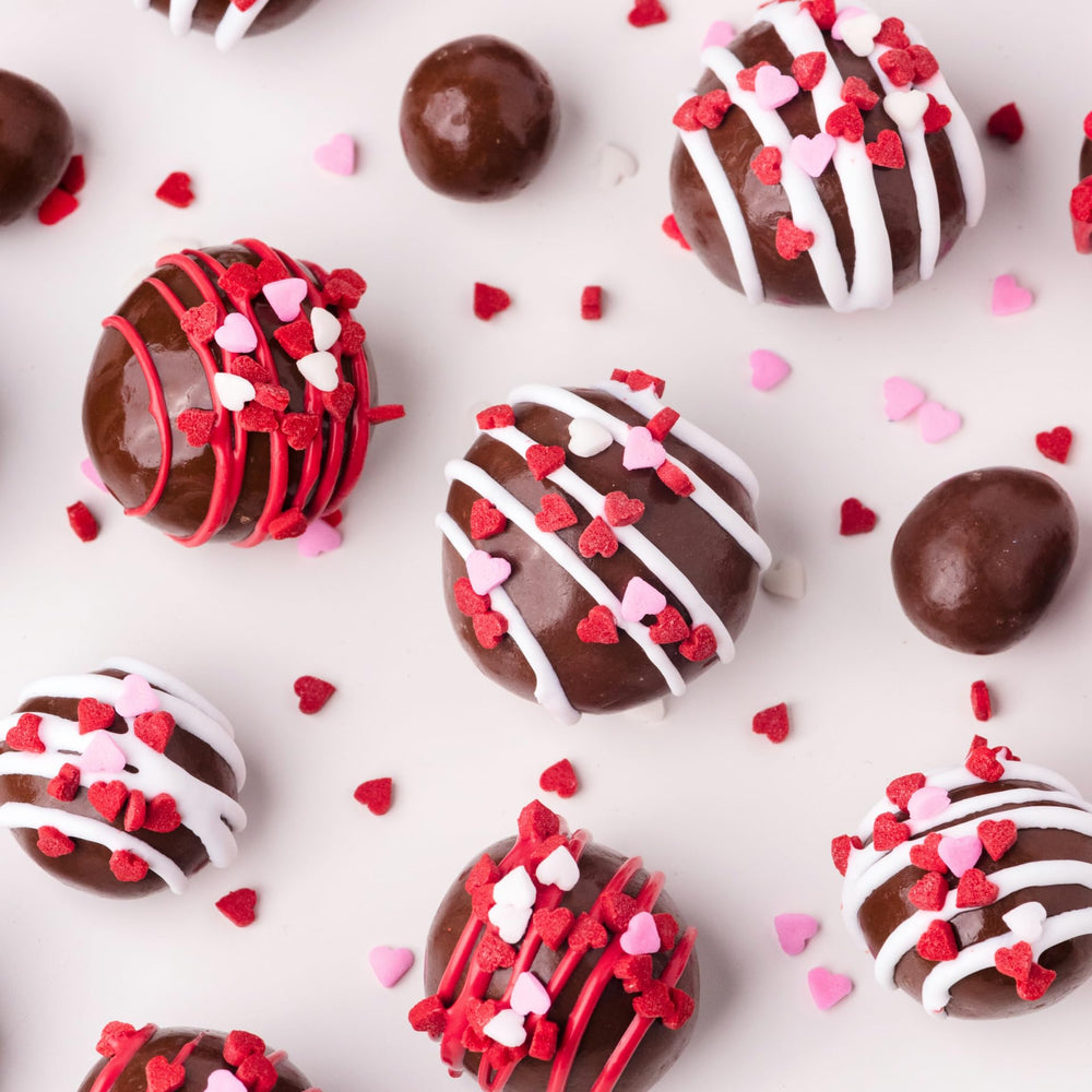 Sweets Indeed sprinkles jar enhances dessert presentation in gift boxes.