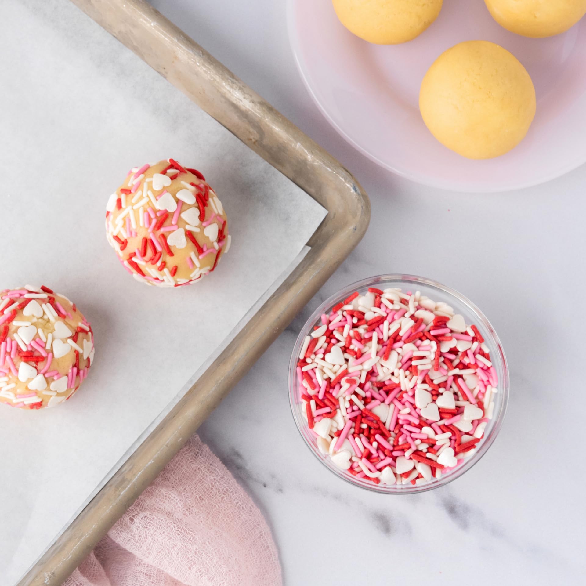 Sweets Indeed sprinkles brighten cookies with red white pink hues and heart accents.