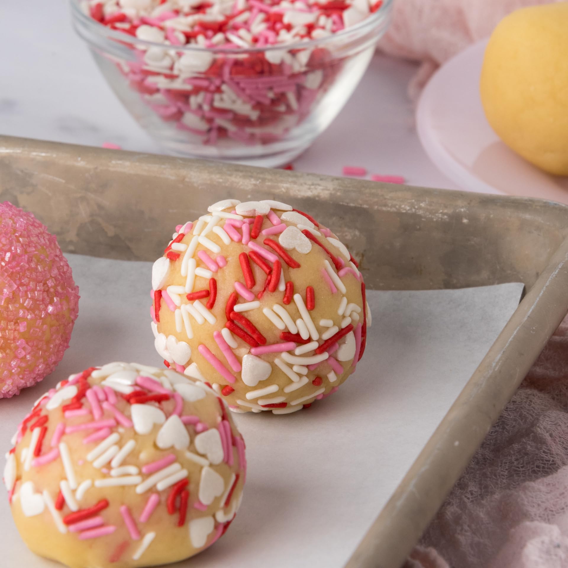 Sweets Indeed Valentine sprinkles inspire decorating ideas with coordinated red, white, and pink hues.