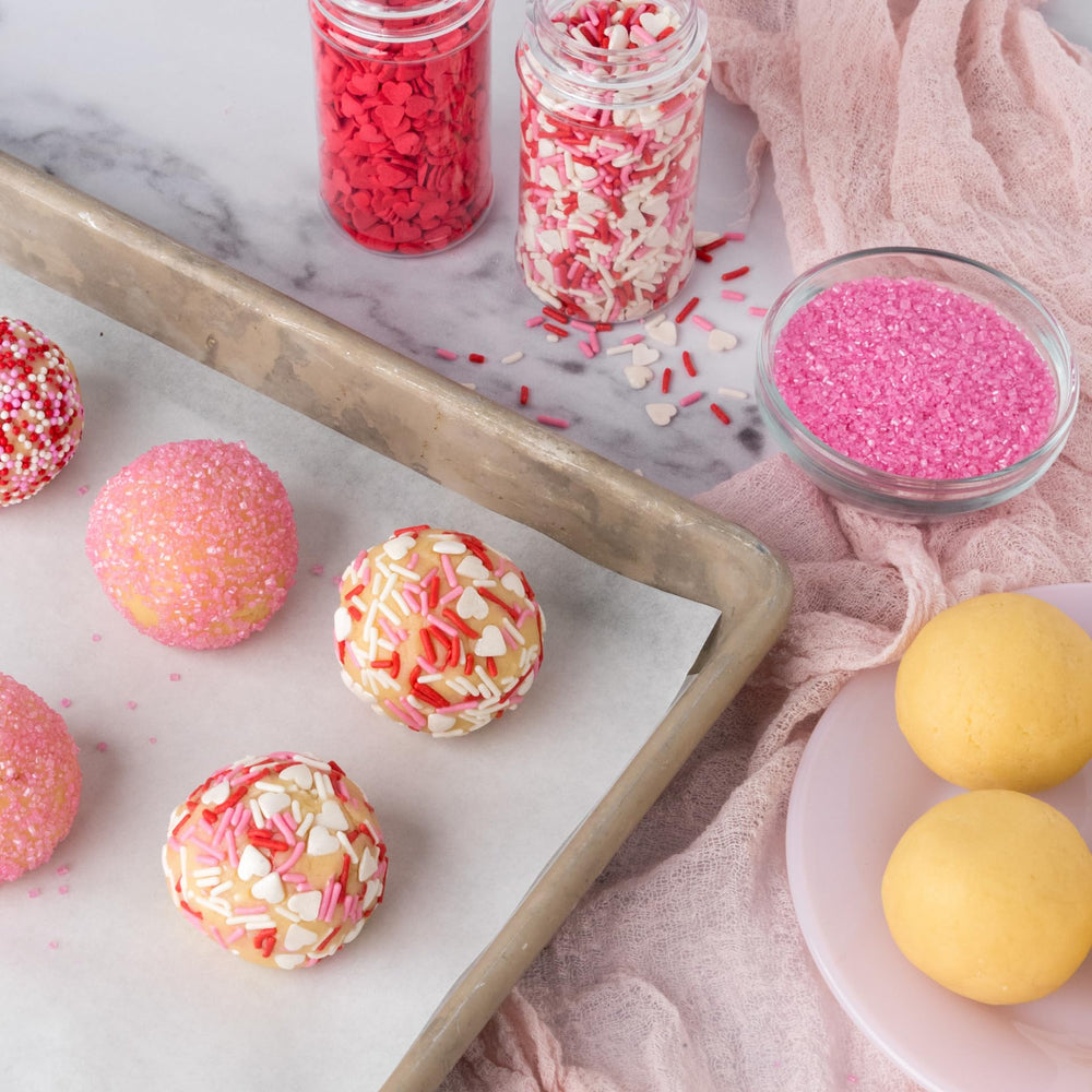 Sweets Indeed four-jar set keeps sprinkles organized for easy decorating.