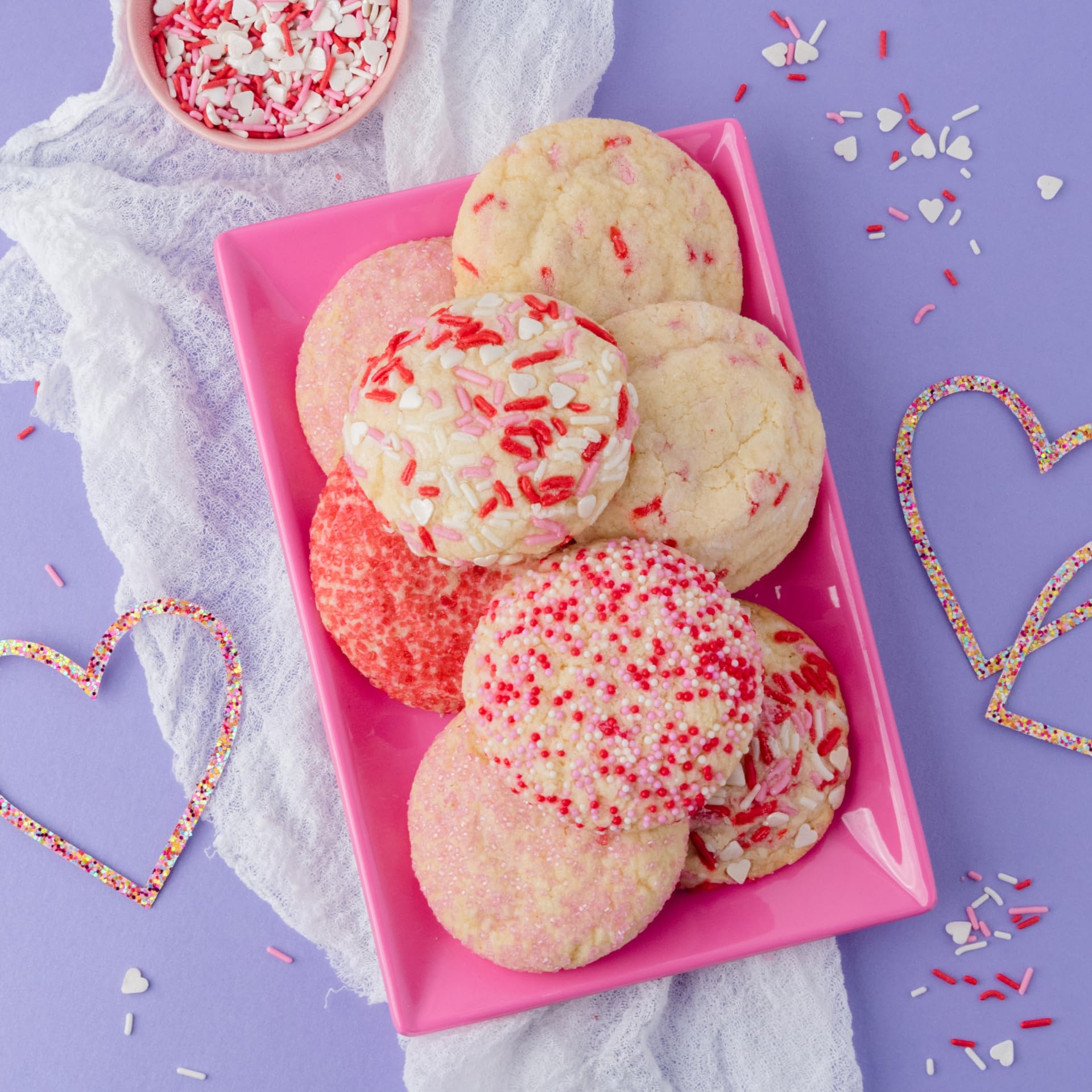 Sweets Indeed Valentine jimmies mix features white hearts for elegant finishes.