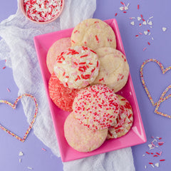 Sweets Indeed Valentine jimmies mix features white hearts for elegant finishes.