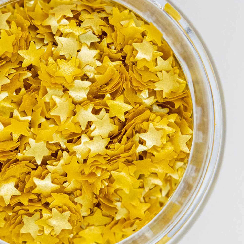 Sweets & Treats Boutique Gold Star Glitter decorates cakes with edible sparkling shine