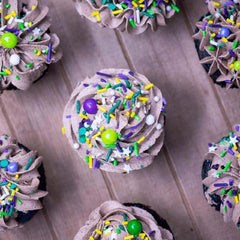Sweets & Treats Boutique king cake sprinkles add playful textures to cupcakes.