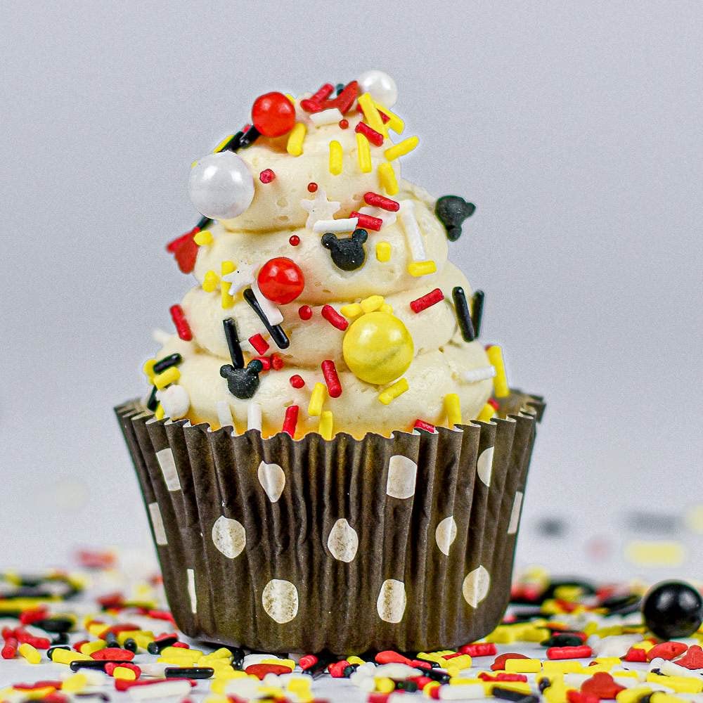Sweets & Treats Boutique Mickey Sprinkles on cupcakes for a fun, vibrant look.