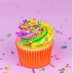 Sweets & Treats Boutique neon confetti sprinkles decorate cakes for a festive look.