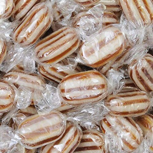 Sweetshop Bonds Of London mint humbugs unwrap, classic British candy moment.