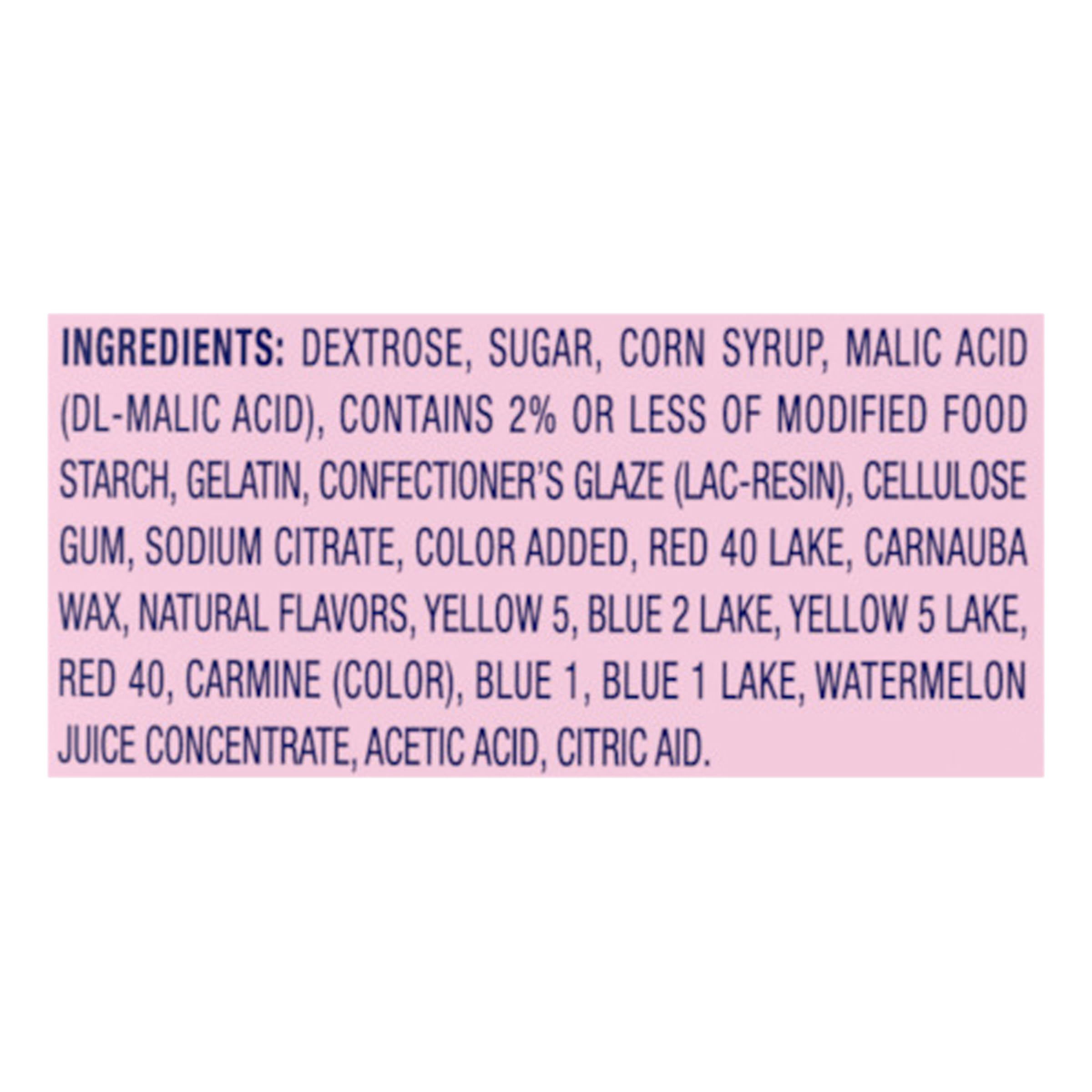 SweeTARTS Chewy Fusions tropical punch pieces mid-twist for a vibrant snack.