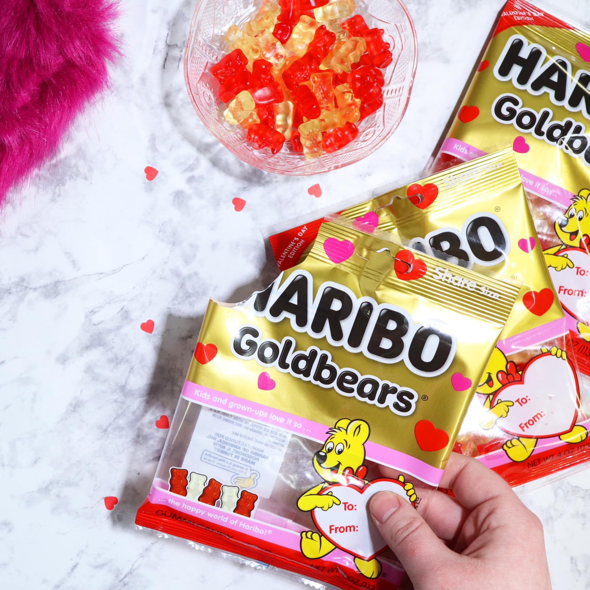 Sweetzo Haribo red and gold packaging enhances seasonal gifting appeal.