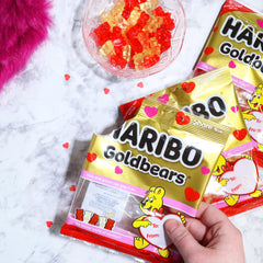 Sweetzo Haribo red and gold packaging enhances seasonal gifting appeal.
