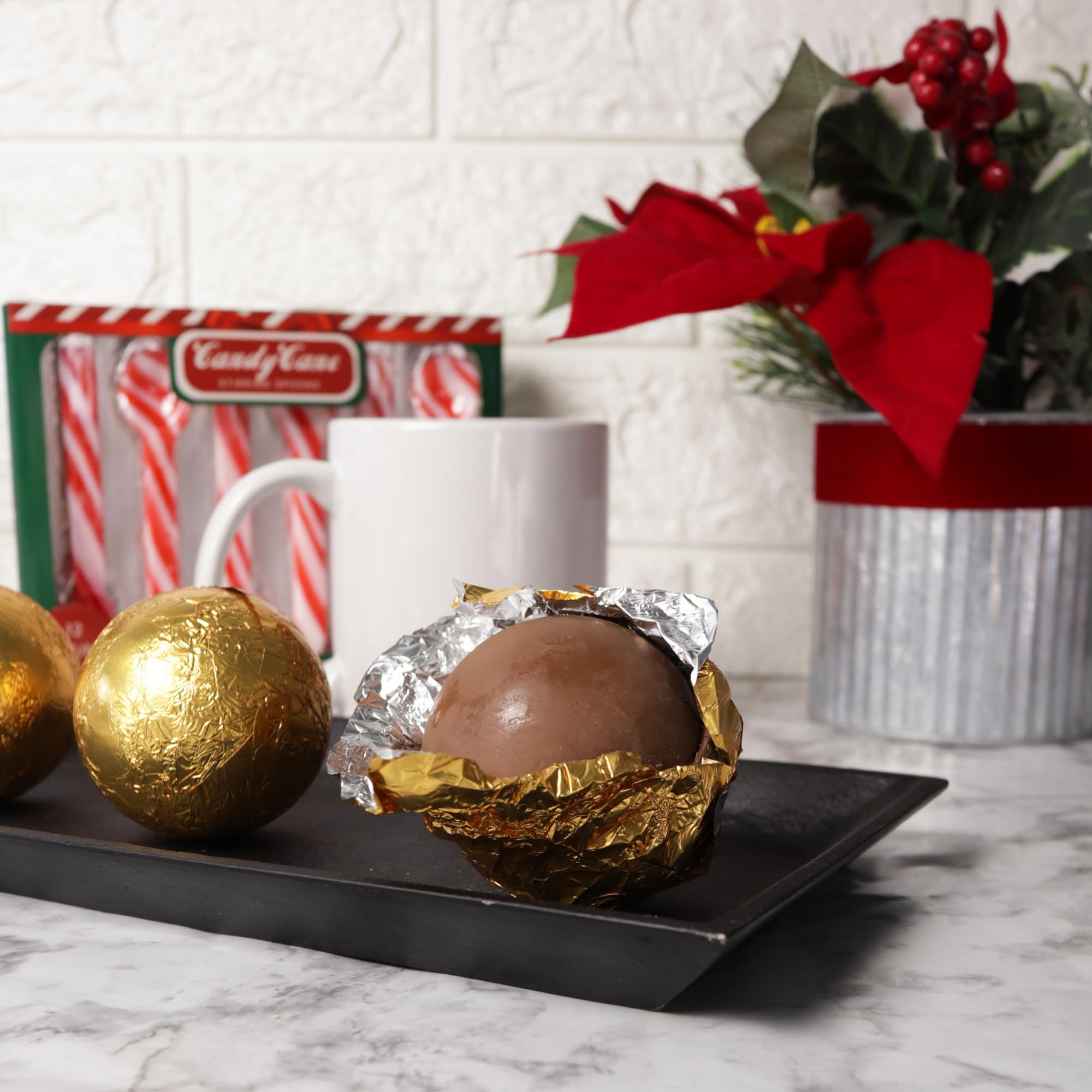 Sweetzo ball cross-section reveals mini marshmallows inside for cozy sips.