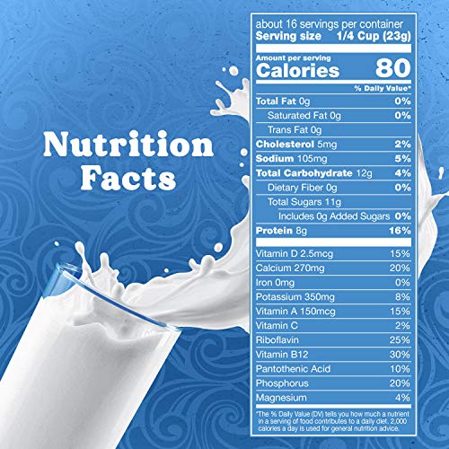 Swiss Miss nonfat dry milk being poured into a mug to mix into warm cocoa.