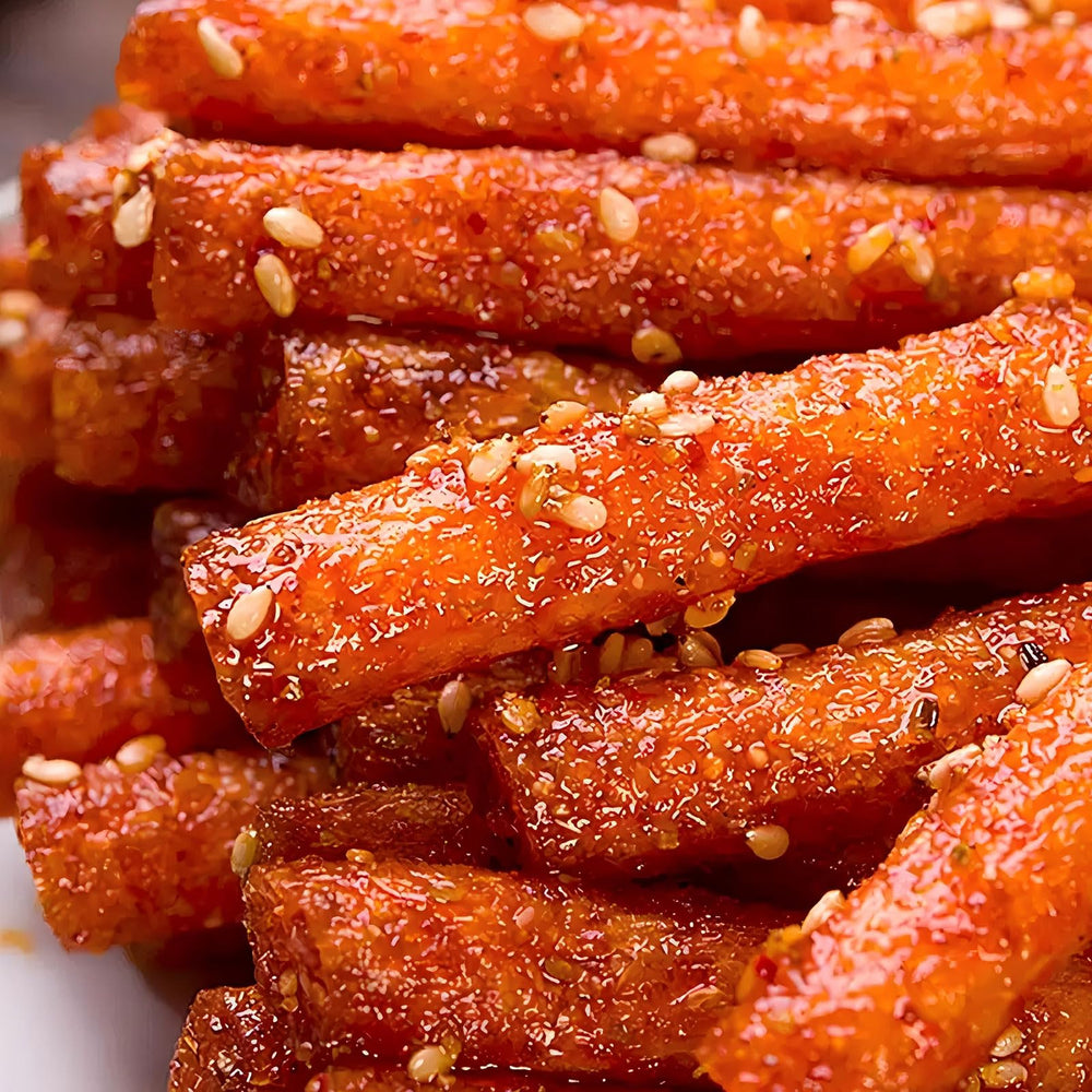 SXETBEAN Latiao spicy strips on a plate with sesame glaze ideal for sharing