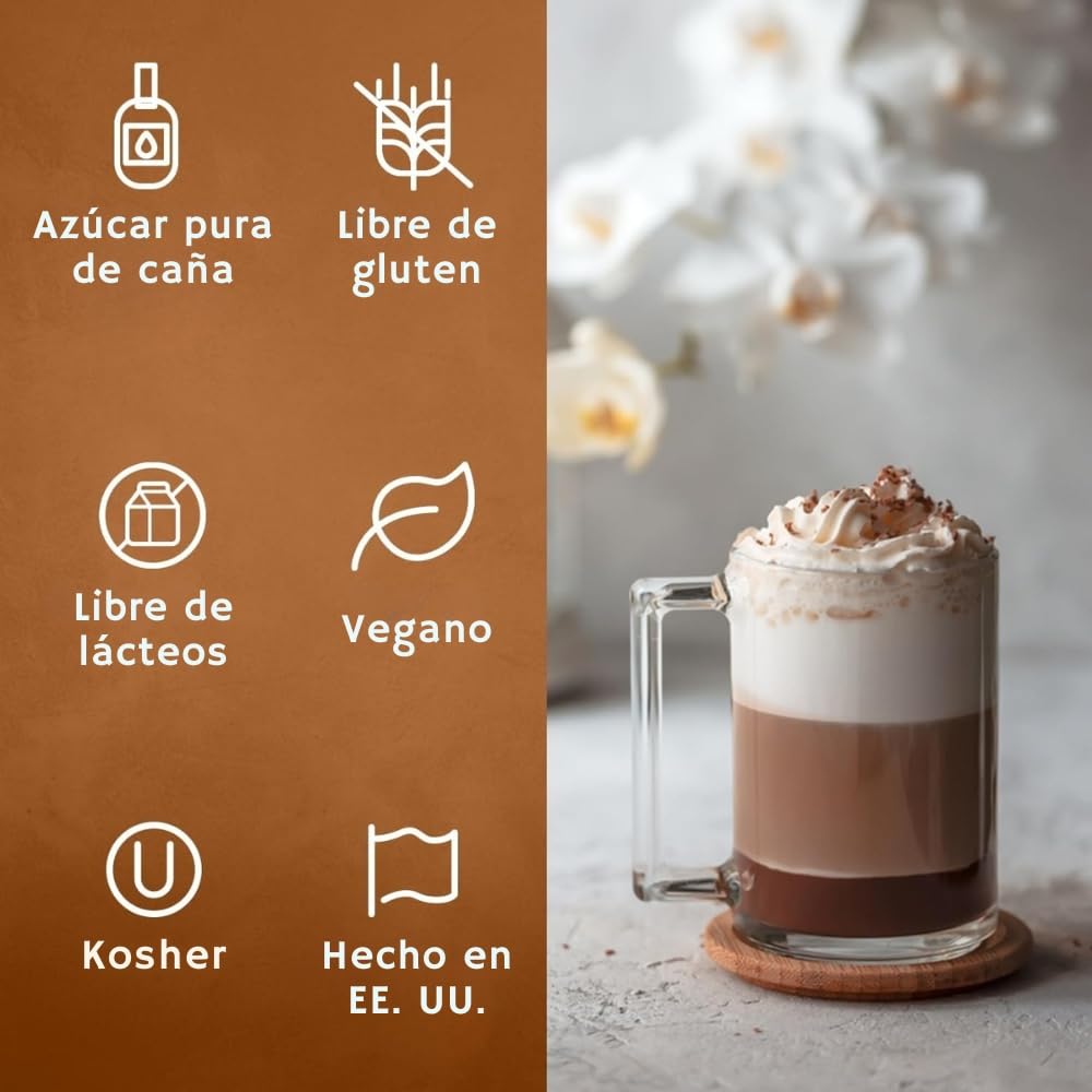 Syruvia Coffee Syrup beside a latte with foam and aroma.