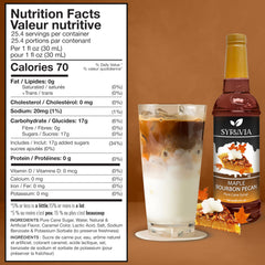 SYRUVIA Maple Bourbon Pecan Syrup poured into a latte for creamy texture.