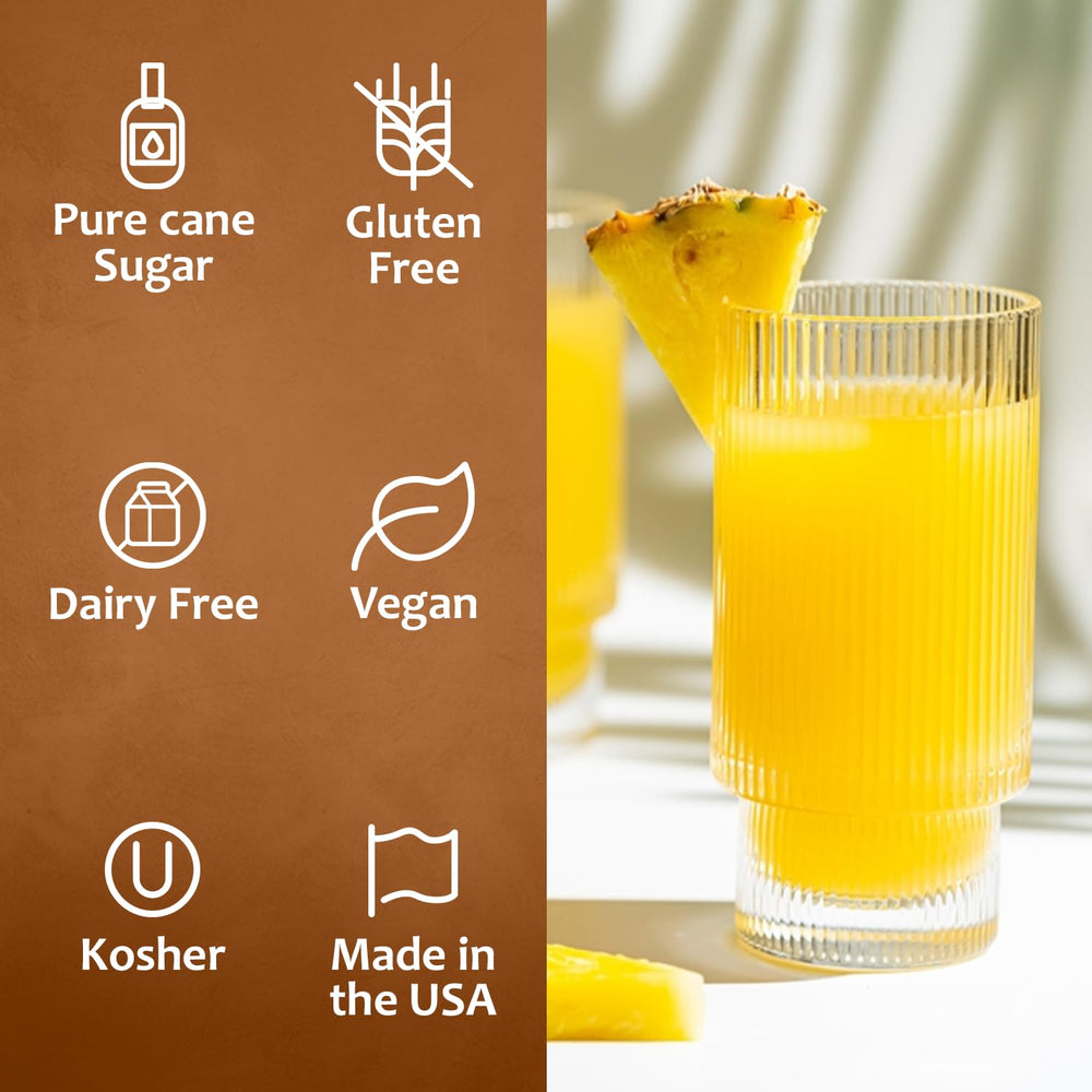 SYRUVIA Pineapple Syrup in a lemonade glass delivering tropical sweetness.