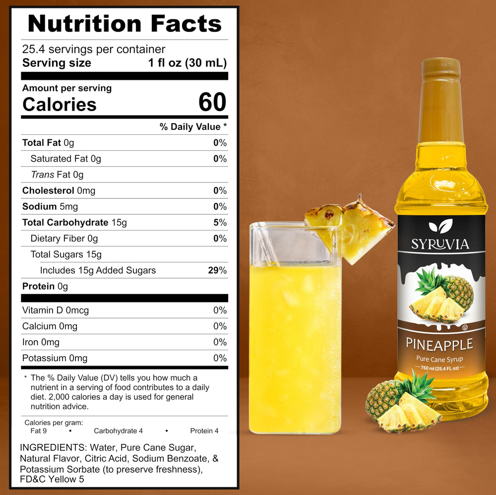 SYRUVIA Pineapple Syrup being poured into a glass for refreshing beverages.