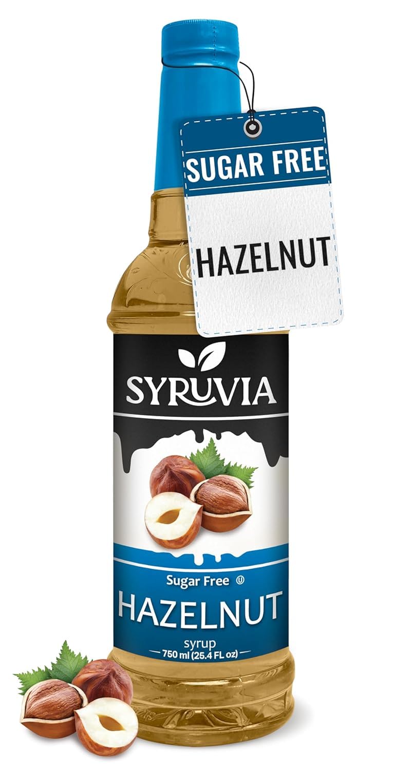 SYRUVIA Sugar-Free Hazelnut Syrup bottle enhances beverages with rich flavor.