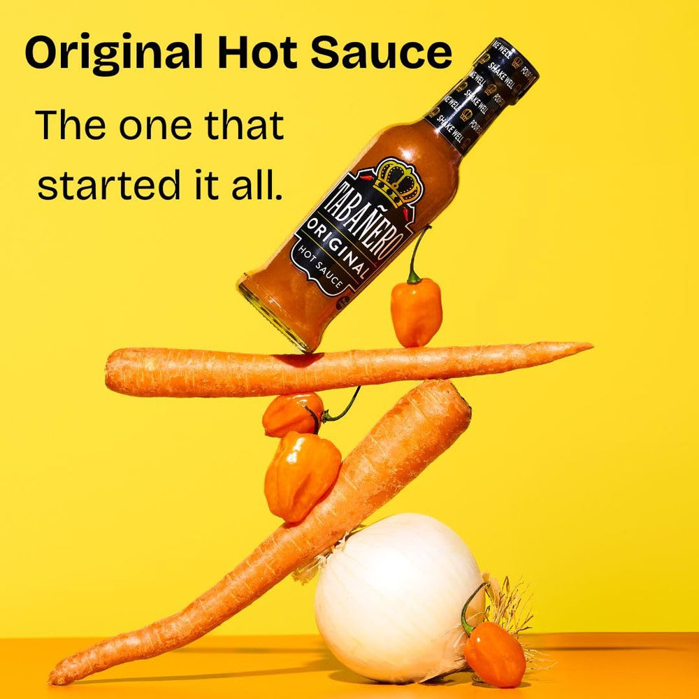 Macro view of Tabanero Original Hot Sauce glass bottle with rich color.