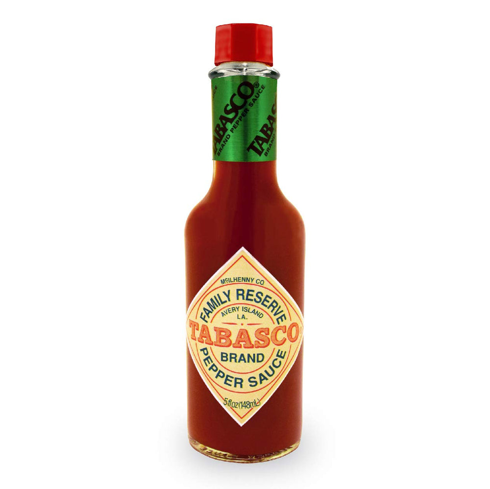 TABASCO Family Reserve Pepper Sauce bottle pour highlighting premium aging and small-batch quality.