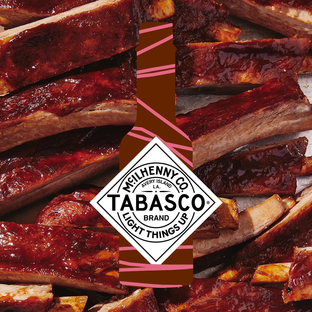 TABASCO Raspberry Chipotle bottle front view: signature condiment ready for kitchen or table.