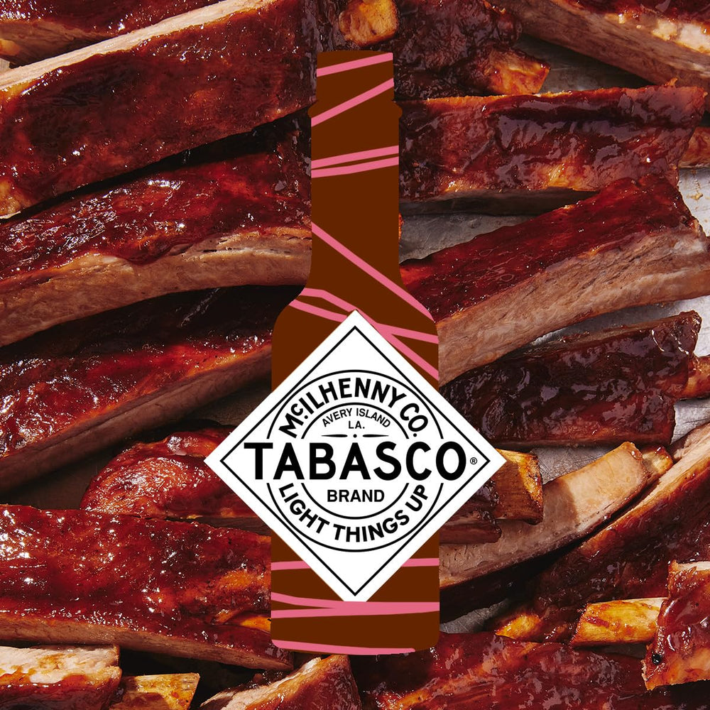 TABASCO Raspberry Chipotle bottle front view: signature condiment ready for kitchen or table.